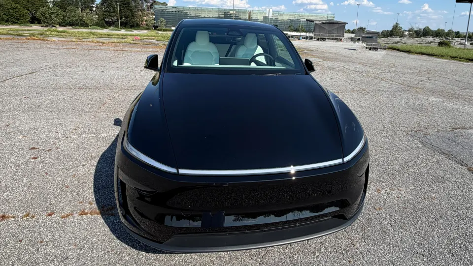 2026 Tesla Model Y in black — front view
